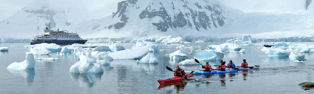 Sea kayaking in a polar bay